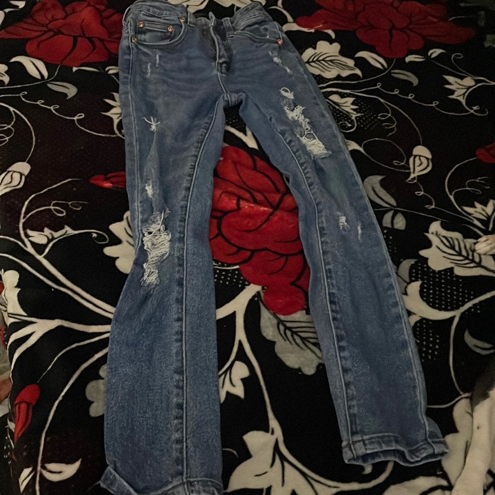 Blue ripped jeans
